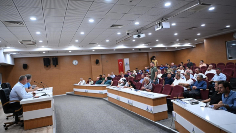 Kocaman'dan muhtarlara: 'Uyum ve ahenkle çalışıyoruz'