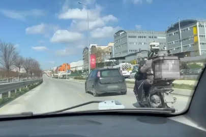 Kuryenin yardımına otomobil sürücüsü çekme halatıyla yetişti
