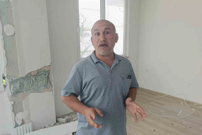 Çatlaklardan ışık görülen apartmanda korku dolu yaşam
